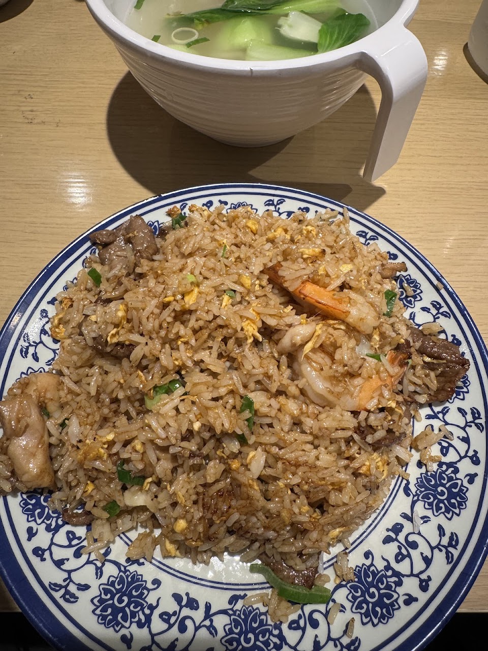 Special fried rice on a blue and white plate